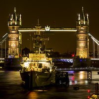 Buy canvas prints of  HMS Belfast by Tower Bridge by Ian Danbury