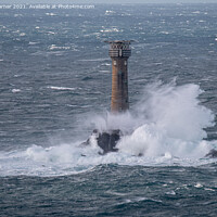 Buy canvas prints of Longships Lighthouse in a Storm  by Brian Garner