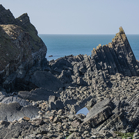 Buy canvas prints of  Layered Rocks off the Hartland Peninsula by Brian Garner