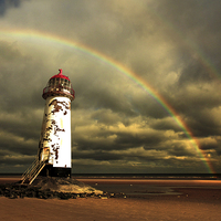 Buy canvas prints of  Rainbow over Talacre Lighthouse Point of Ayr Wale by Mal Bray