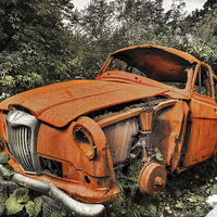 Buy canvas prints of  Old and Rusty Riley Classic Car by Mal Bray