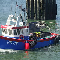 Buy canvas prints of Fishing Boat at Whitstable by John Bridge