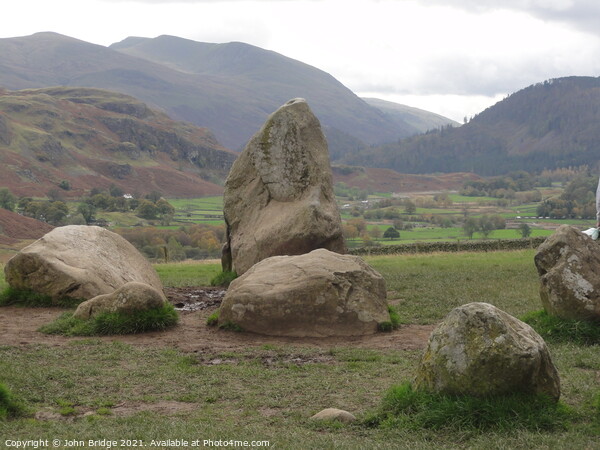 Ancient Rocks in the Lake District Picture Board by John Bridge