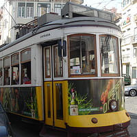 Buy canvas prints of Lisbon Tram by John Bridge