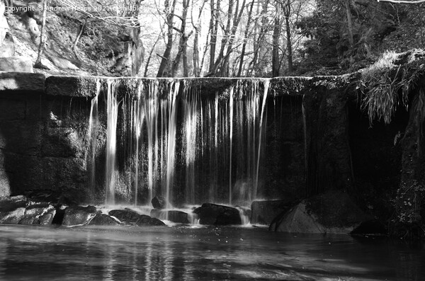 Waterfall with misty water with sun rays  Picture Board by Andrew Heaps