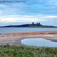 Buy canvas prints of Dunstanburgh Castle viewed from beach. by Andrew Heaps