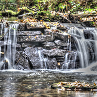 Buy canvas prints of Small misty waterfall by Andrew Heaps