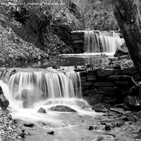 Buy canvas prints of Winter scene of waterfall stream slow shutter blac by Andrew Heaps