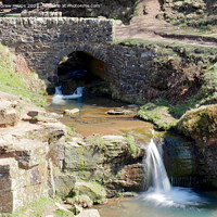 Buy canvas prints of Three Shires Head small waterfall by Andrew Heaps