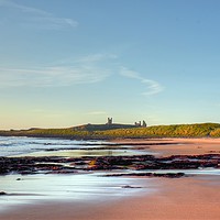Buy canvas prints of Sunrise looking over Dunstanburgh Castle HDR by Andrew Heaps