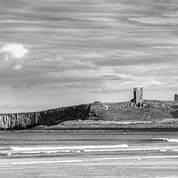 Buy canvas prints of Dunstanburgh Castle from the beach. by Andrew Heaps