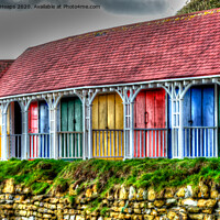 Buy canvas prints of Scarborough HDR Row of colourful beach huts  by Andrew Heaps