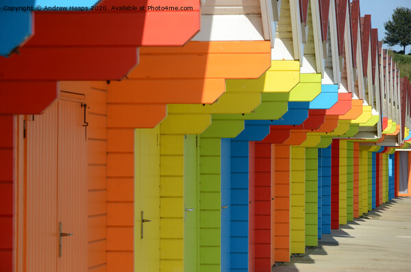 Row of colourful beach huts Picture Board by Andrew Heaps