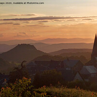 Buy canvas prints of Majestic Sunset Over Auvergne Village by Andrew Heaps