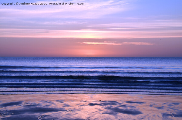 Sunrise from a Northumberland beach. Picture Board by Andrew Heaps