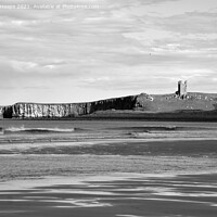 Buy canvas prints of Dunstanburgh castle in Northumberland by Andrew Heaps