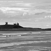 Buy canvas prints of Dunstanburgh castle with waves viewed from beach. by Andrew Heaps