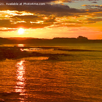Buy canvas prints of Sunset near Bamburgh Castle. by Andrew Heaps