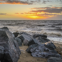 Buy canvas prints of  Heacham Sunset on the rocks by Simon Taylor