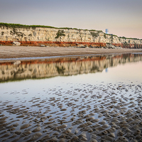 Buy canvas prints of  Hunstanton Cliffs at Low tide by Simon Taylor