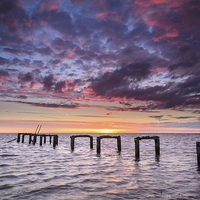 Buy canvas prints of The old Snettisham Jetty at Sunset by Simon Taylor