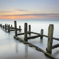 Buy canvas prints of Sunrise Long Exposure at Overstrand by Simon Taylor