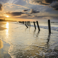 Buy canvas prints of  Happisburgh silhouettes, Norfolk by Simon Taylor