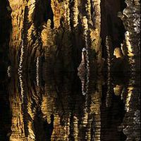 Buy canvas prints of Spectacular stalagmites reflected in water by Mike Marsden