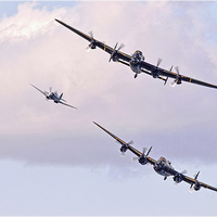 Buy canvas prints of  Lancasters and Spitfire by John Downes