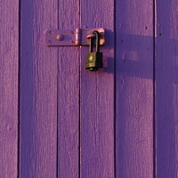 Buy canvas prints of Fading Light, Beach Hut Padlock by Andrew Wright