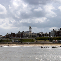 Buy canvas prints of  southwold lighthouse and beach by cerrie-jayne edmonds