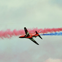 Buy canvas prints of  The red arrows 2015 head on pass by Andy Stringer