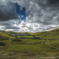 Buy canvas prints of The Welsh Valley Road to Llandovery. by William Duggan