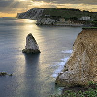 Buy canvas prints of Shafts of light over Freshwater Bay by Andrew Ray