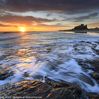 Buy canvas prints of Sunrise at Bamburgh by Andrew Ray