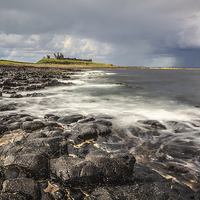 Buy canvas prints of Approaching Storm at Dunstanburgh by Andrew Ray