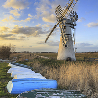 Buy canvas prints of Boats at Thurne Drainage Mill by Andrew Ray