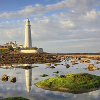 Buy canvas prints of Lighthouse Reflections (St Mary's) by Andrew Ray