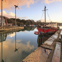 Buy canvas prints of Boats at Sunrise (Penryn) by Andrew Ray