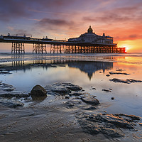 Buy canvas prints of Sunrise reflections (Eastborne Pier) by Andrew Ray