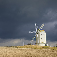 Buy canvas prints of Storm clouds over Ashness Windmill by Andrew Ray