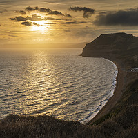 Buy canvas prints of Towards the Golden Cap and setting sun by Andrew Ray