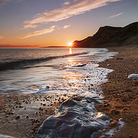 Buy canvas prints of The setting sun from Eype Mouth Beach by Andrew Ray