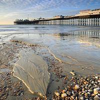 Buy canvas prints of Low tide at the Palace Pier (Brighton) by Andrew Ray