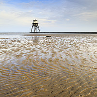 Buy canvas prints of Sand ripples at Dovercourt Lighthouse by Andrew Ray
