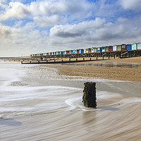 Buy canvas prints of Beach huts at Frinton-on-Sea by Andrew Ray