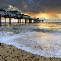 Buy canvas prints of Stormy clouds at sunrise (Southwold Pier) by Andrew Ray