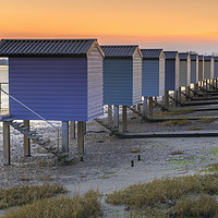 Buy canvas prints of Osea Beach Huts at sunset by Andrew Ray