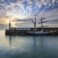 Buy canvas prints of Lighthouse and tall ship (Newlyn) by Andrew Ray