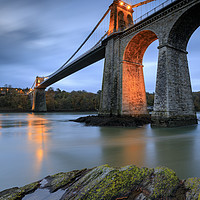 Buy canvas prints of Twilight at the Menai Suspension Bridge by Andrew Ray